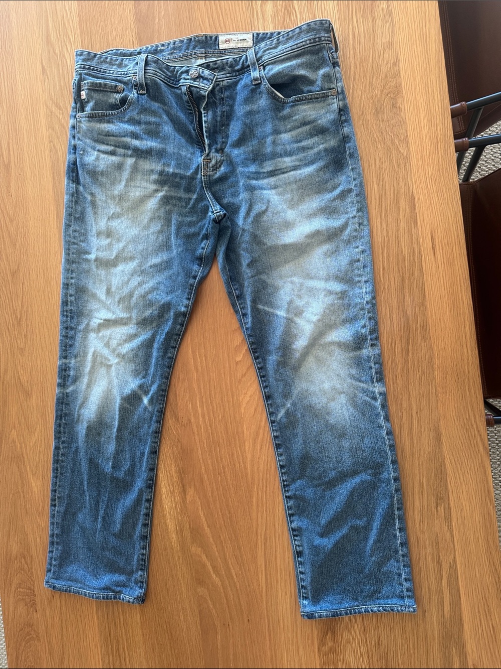 Ag Adriano Goldschmied Men's Light Blue Washed Slim Straight Jeans. Everett
